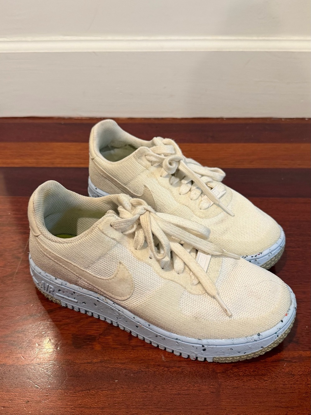 Nike Cream Canvas Sneakers with Blue Speckled Sole